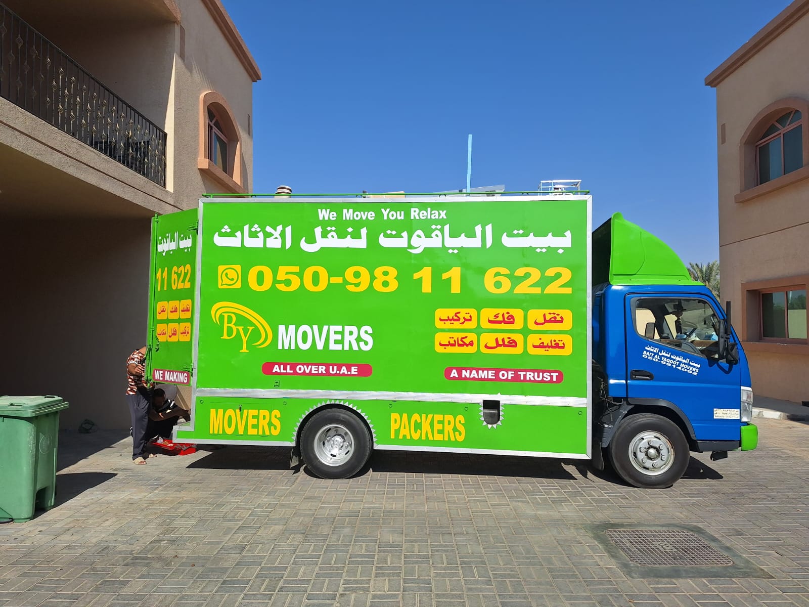 Villa and office movers in Al Ain loading a moving truck